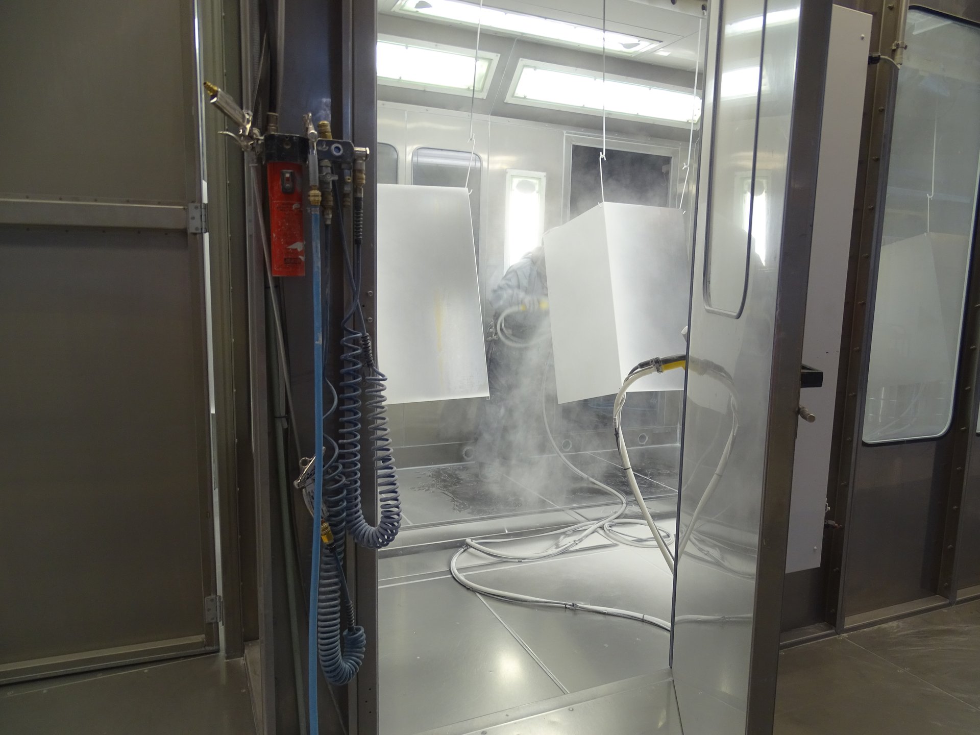 Powder coating — Real manufacturing photography · reference process environment