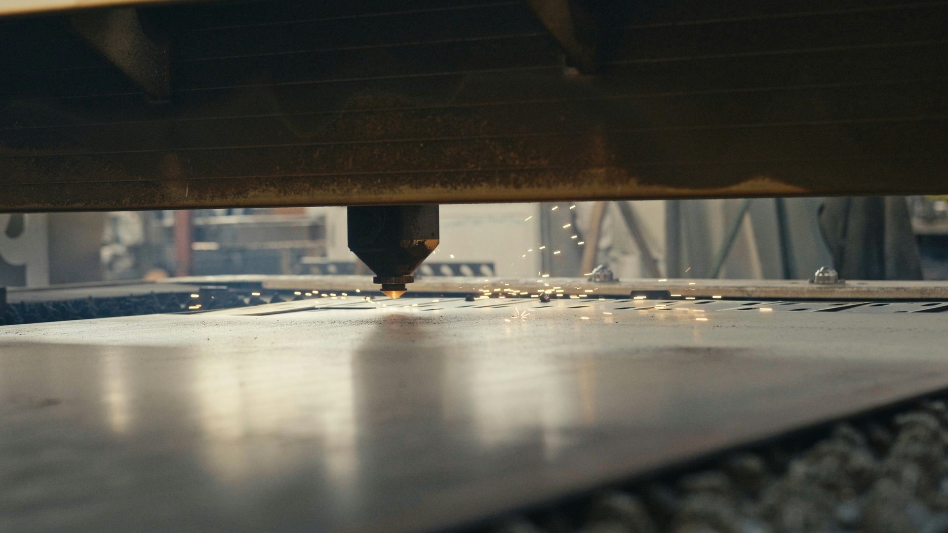 Laser cutting — Real manufacturing photography · reference process environment
